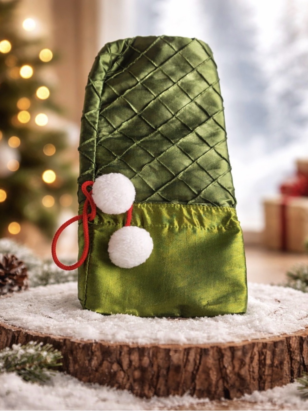 Green Quilted Stocking with White Pom Poms